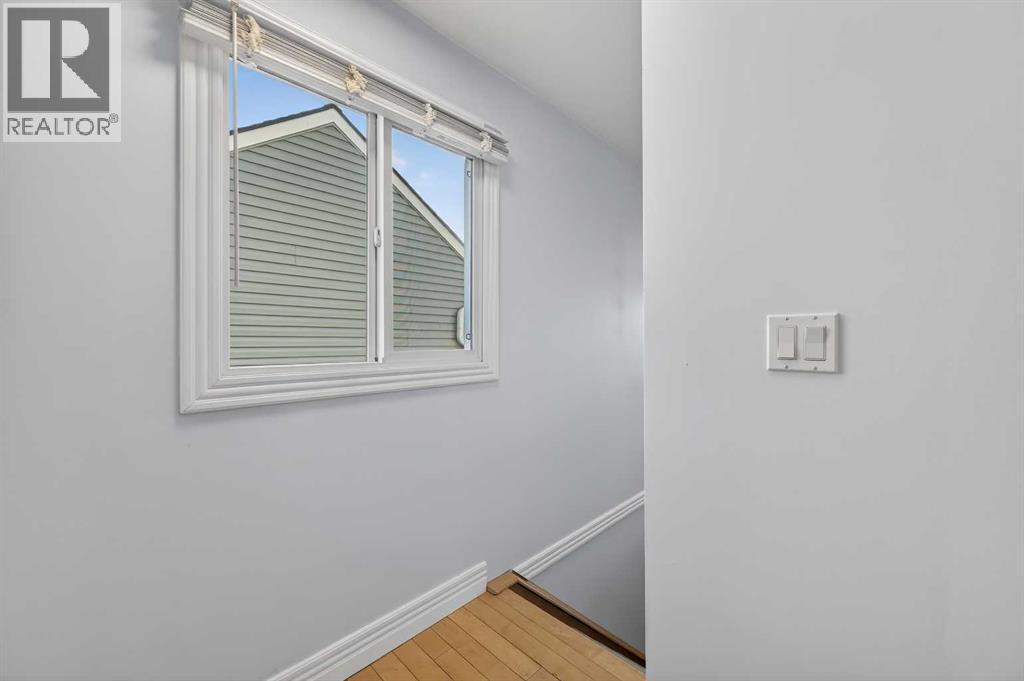 211, 25 Glamis Green Sw, Calgary, AB - Indoor Photo Showing Other Room