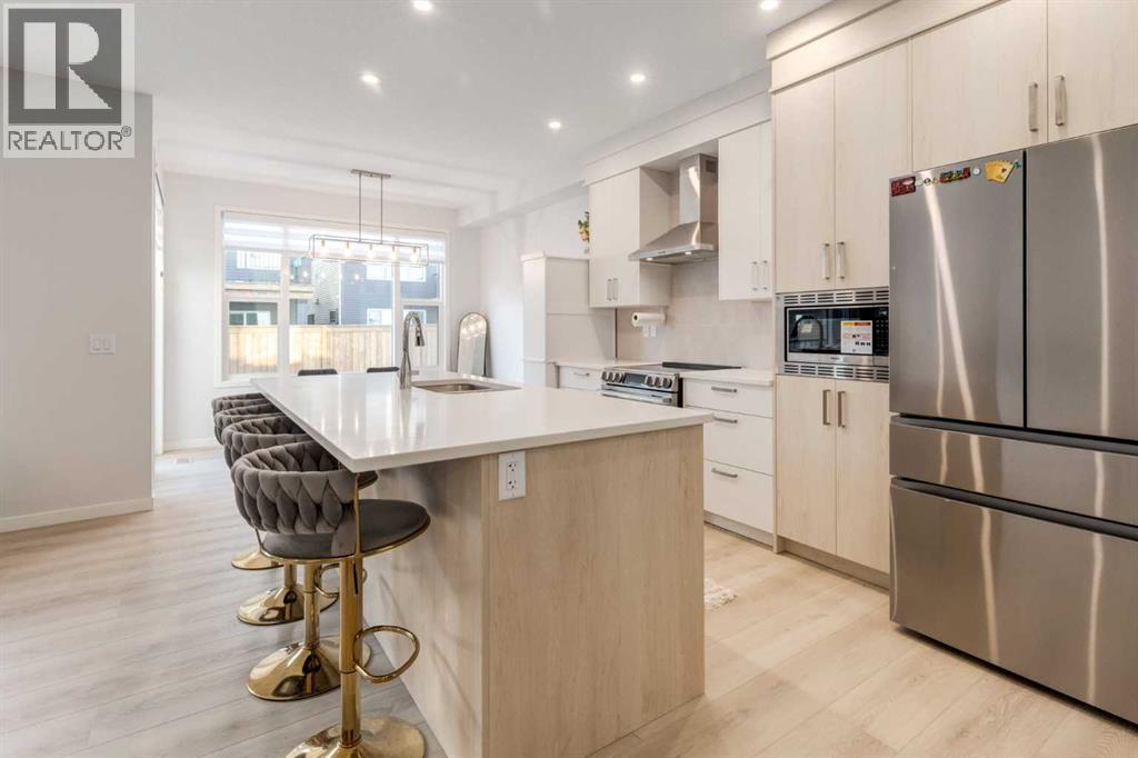 29 Marmot Passage Nw, Calgary, AB - Indoor Photo Showing Kitchen With Stainless Steel Kitchen With Upgraded Kitchen