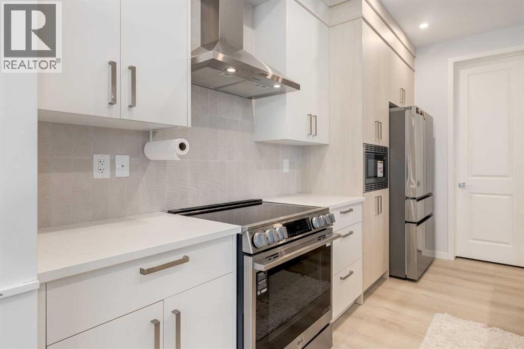 29 Marmot Passage Nw, Calgary, AB - Indoor Photo Showing Kitchen With Stainless Steel Kitchen With Upgraded Kitchen