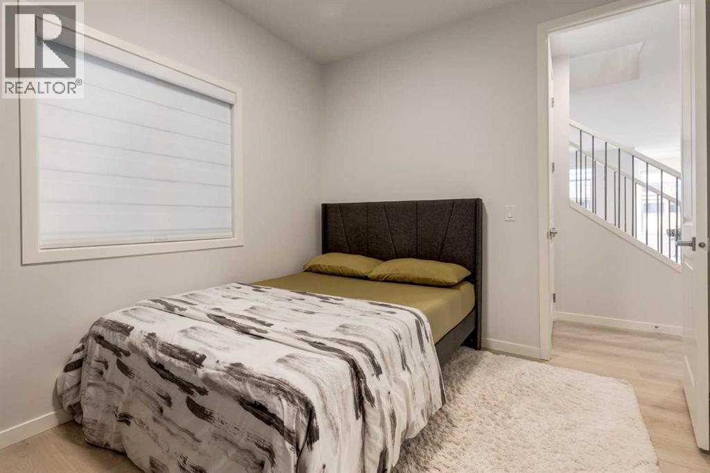 29 Marmot Passage Nw, Calgary, AB - Indoor Photo Showing Bedroom