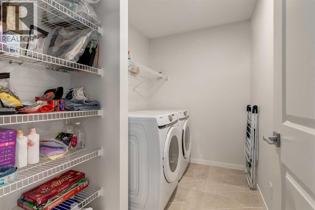 29 Marmot Passage Nw, Calgary, AB - Indoor Photo Showing Laundry Room