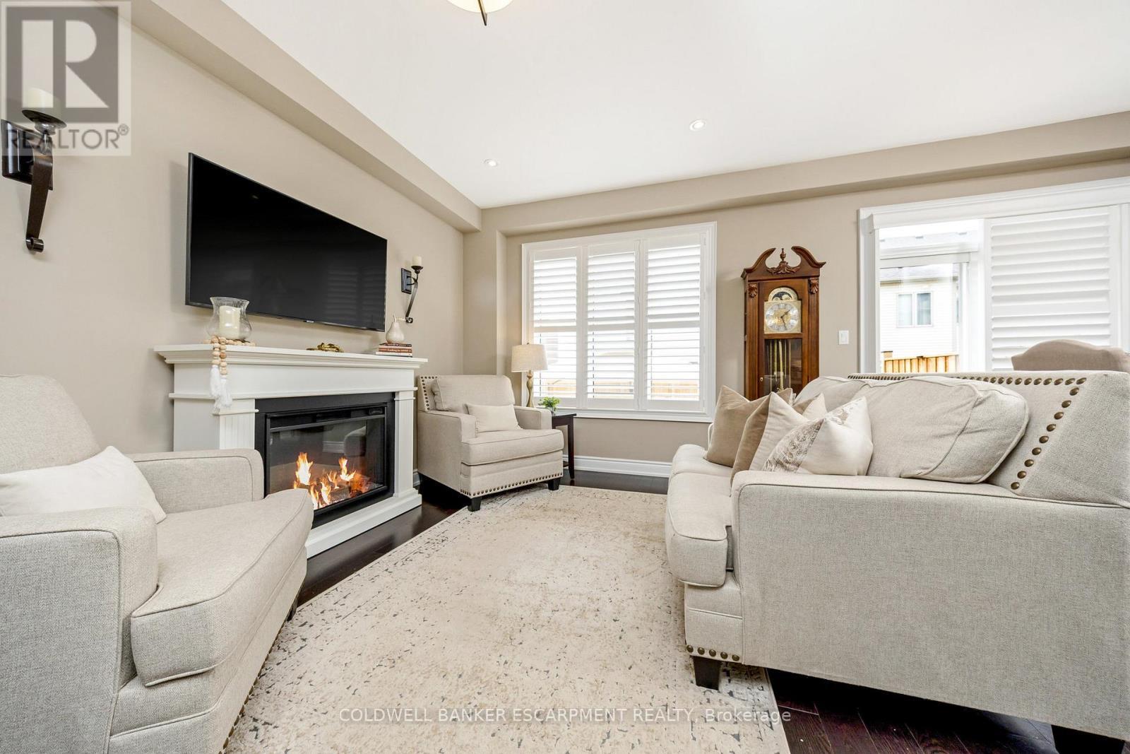 107 Taylor Avenue, Guelph/Eramosa, ON - Indoor Photo Showing Living Room With Fireplace