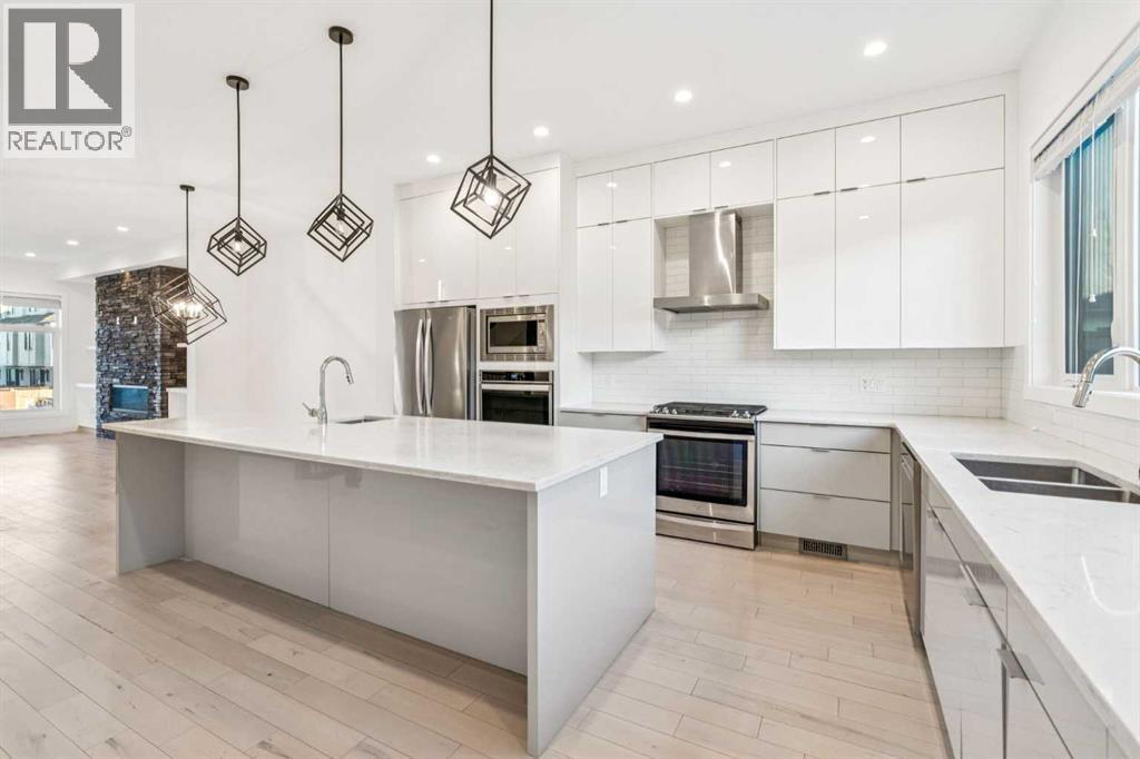 2409 28 Avenue Sw, Calgary, AB - Indoor Photo Showing Kitchen With Double Sink With Upgraded Kitchen