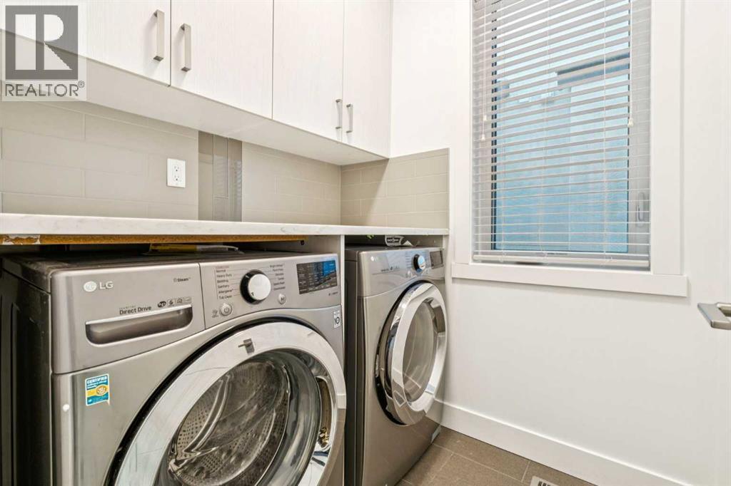 2409 28 Avenue Sw, Calgary, AB - Indoor Photo Showing Laundry Room