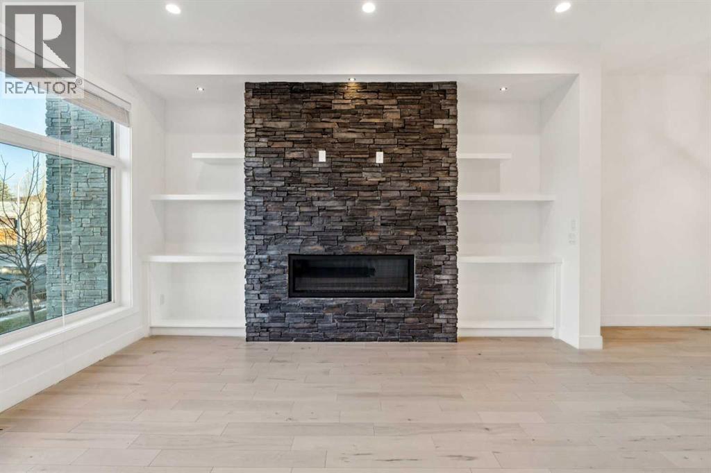 2409 28 Avenue Sw, Calgary, AB - Indoor Photo Showing Living Room With Fireplace