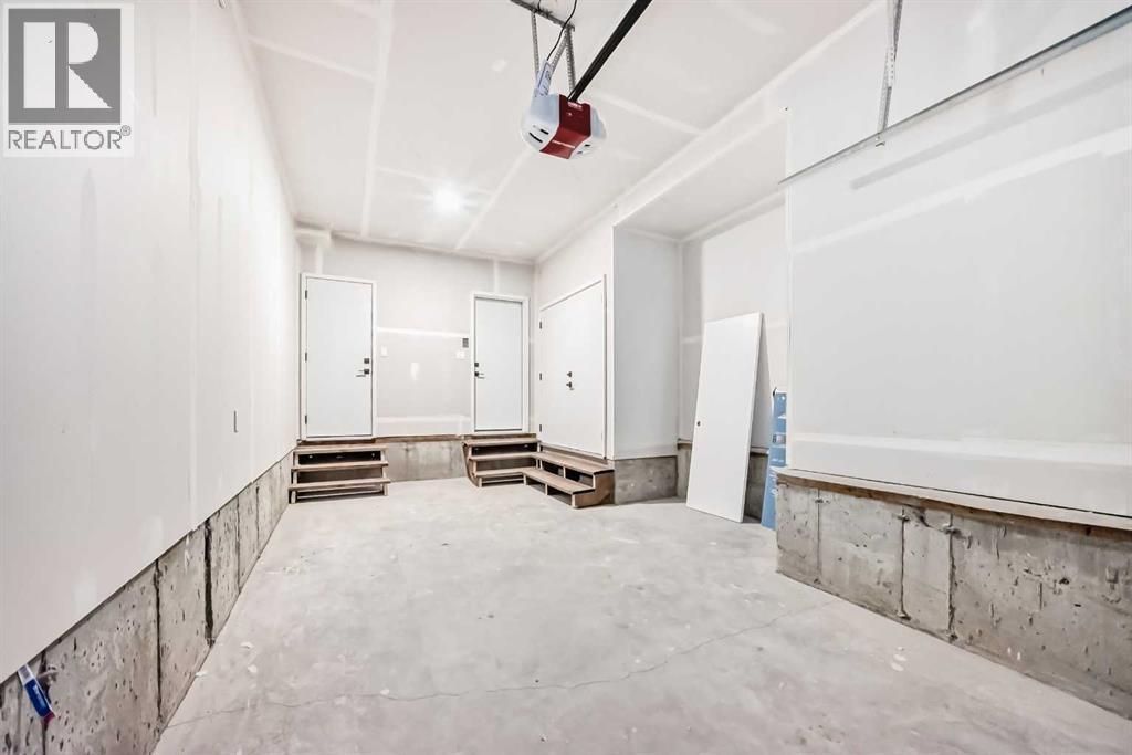 Garage - 8530 Bowness Road Nw, Calgary, AB - Indoor Photo Showing Other Room