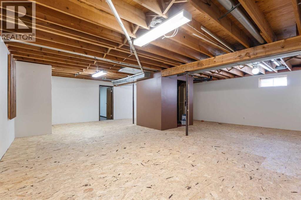 27 Tressa Street, Swan Hills, AB - Indoor Photo Showing Basement