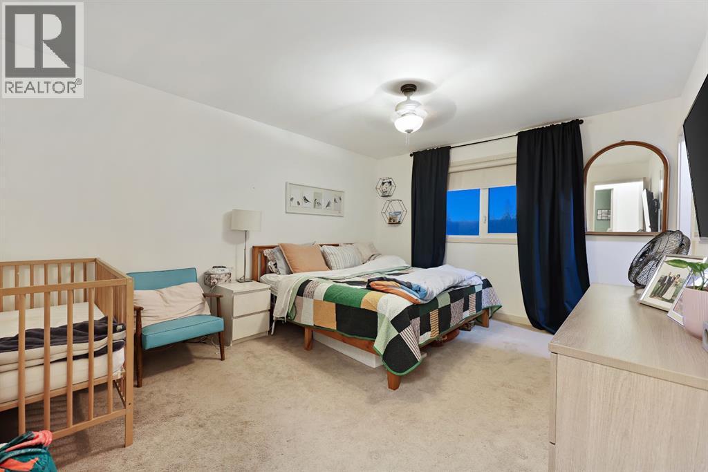 256 Lysander Place Se, Calgary, AB - Indoor Photo Showing Bedroom