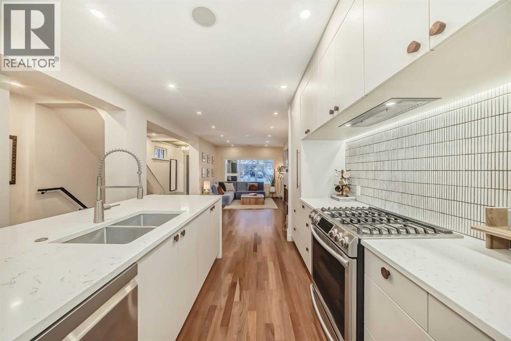 2120 18 Street Sw, Calgary, AB - Indoor Photo Showing Kitchen With Double Sink With Upgraded Kitchen