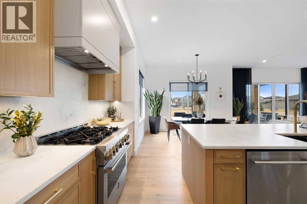 19 Monterra Way, Rural Rocky View County, AB - Indoor Photo Showing Kitchen With Upgraded Kitchen