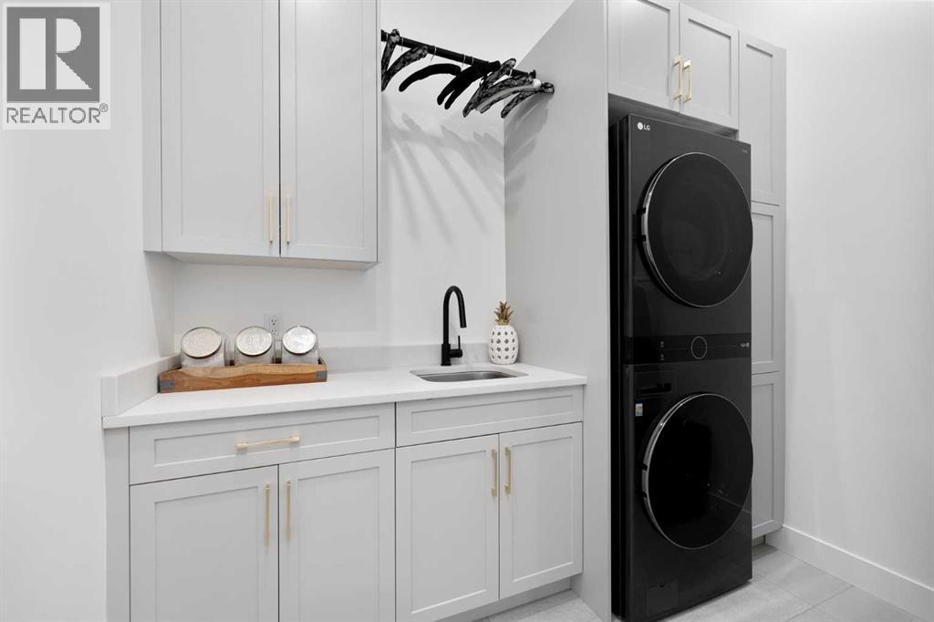 19 Monterra Way, Rural Rocky View County, AB - Indoor Photo Showing Laundry Room