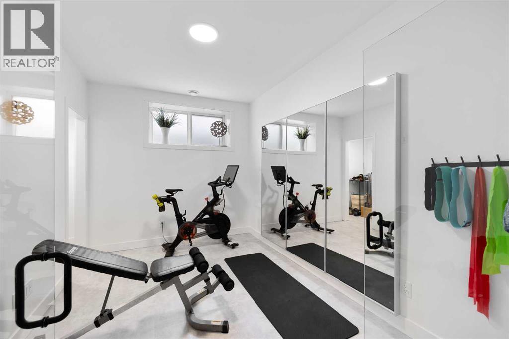 19 Monterra Way, Rural Rocky View County, AB - Indoor Photo Showing Gym Room