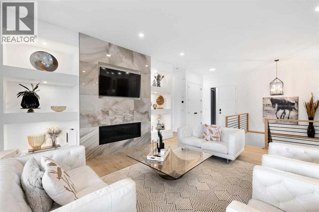 19 Monterra Way, Rural Rocky View County, AB - Indoor Photo Showing Living Room With Fireplace