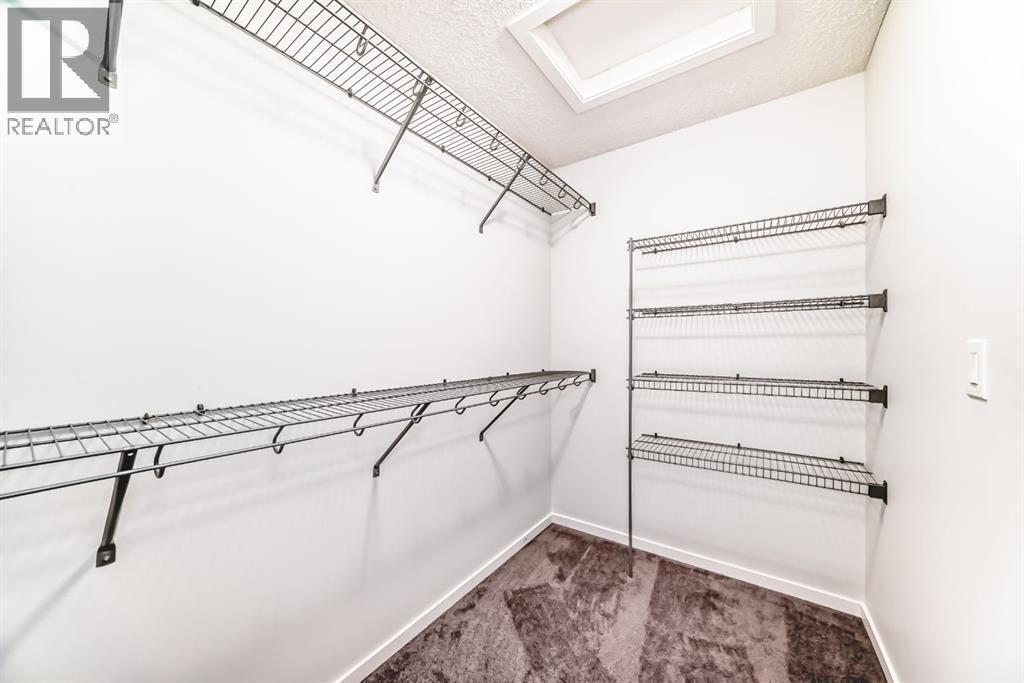 140 Carringham Road Nw, Calgary, AB - Indoor With Storage