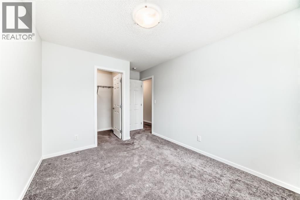 140 Carringham Road Nw, Calgary, AB - Indoor Photo Showing Other Room