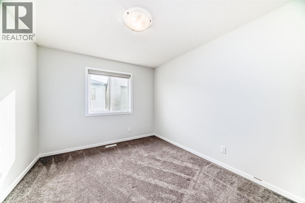 140 Carringham Road Nw, Calgary, AB - Indoor Photo Showing Other Room