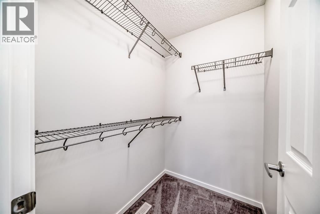 140 Carringham Road Nw, Calgary, AB - Indoor With Storage