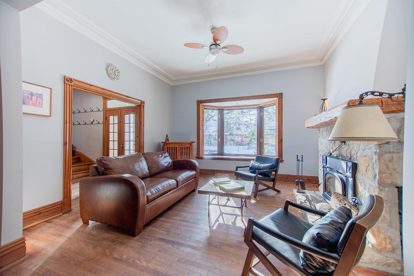 Salon - 330 Av. Edison, Saint-Lambert, QC - Indoor Photo Showing Living Room With Fireplace