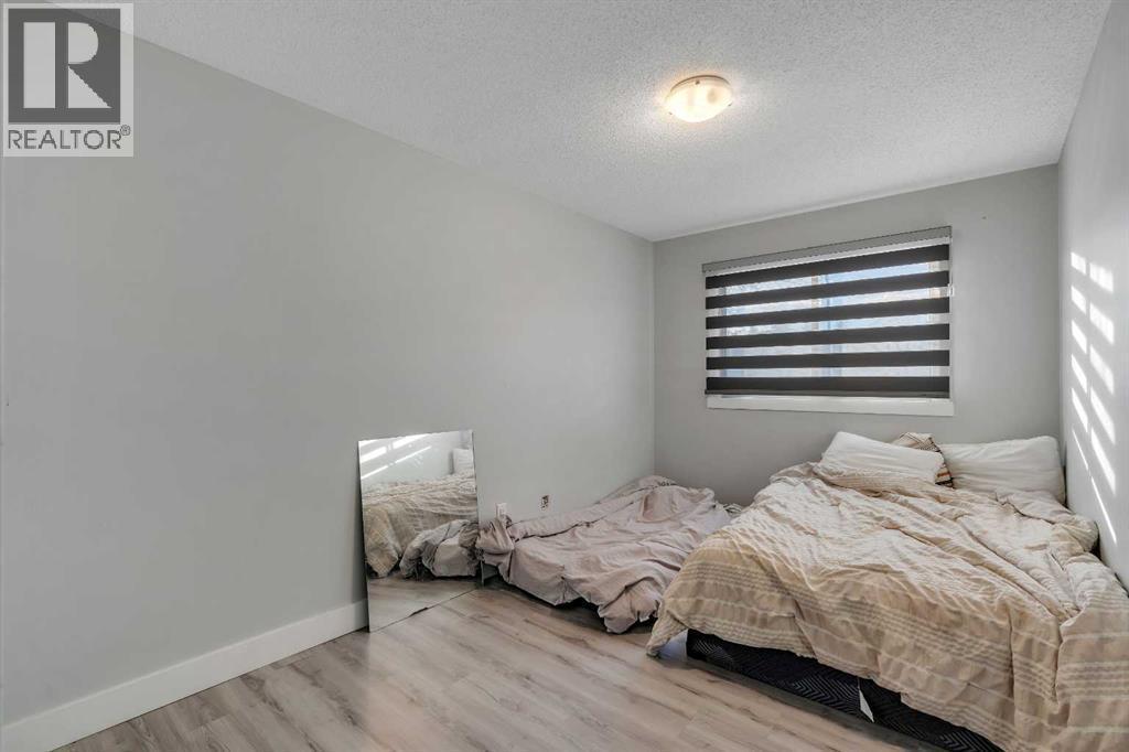 108 Whiteglen Crescent Ne, Calgary, AB - Indoor Photo Showing Bedroom