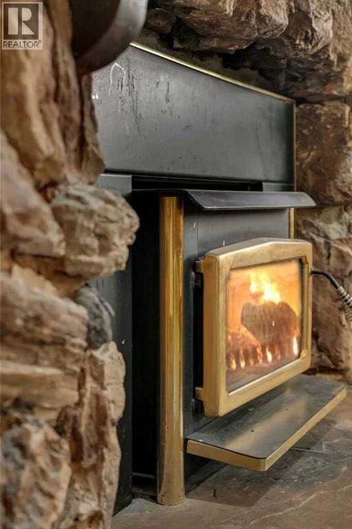 108 Whiteglen Crescent Ne, Calgary, AB - Indoor With Fireplace