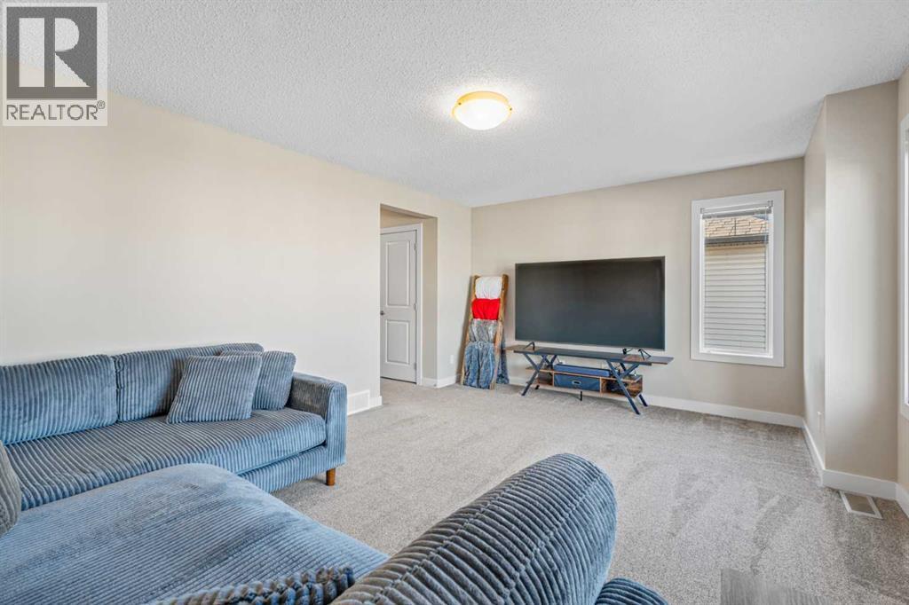 Perfect for movie nights - 308 Chaparral Valley Way Se, Calgary, AB - Indoor Photo Showing Living Room