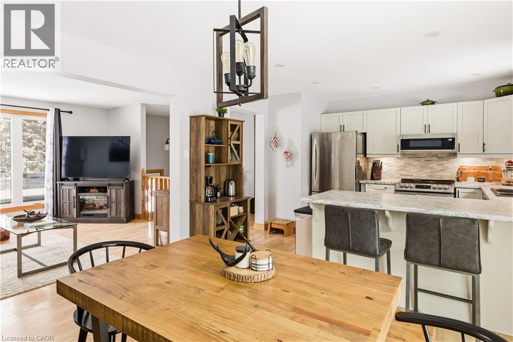 Dining space featuring light wood finished floors - 230 Saugeen Street, Grey Highlands, ON - Indoor