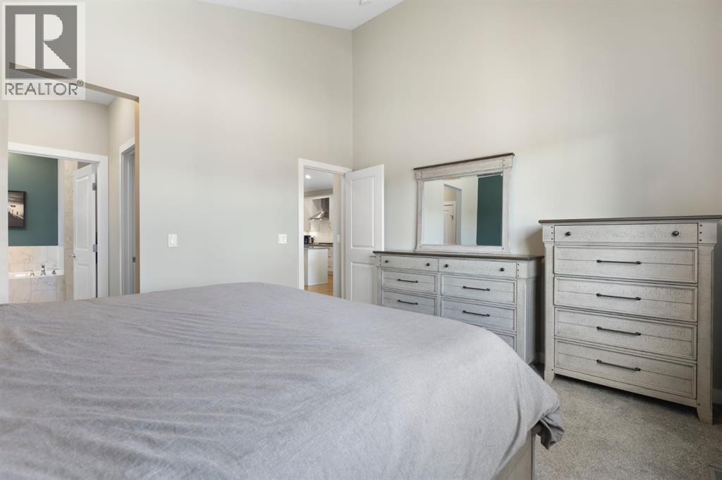 86 Bayview Circle Sw, Airdrie, AB - Indoor Photo Showing Bedroom