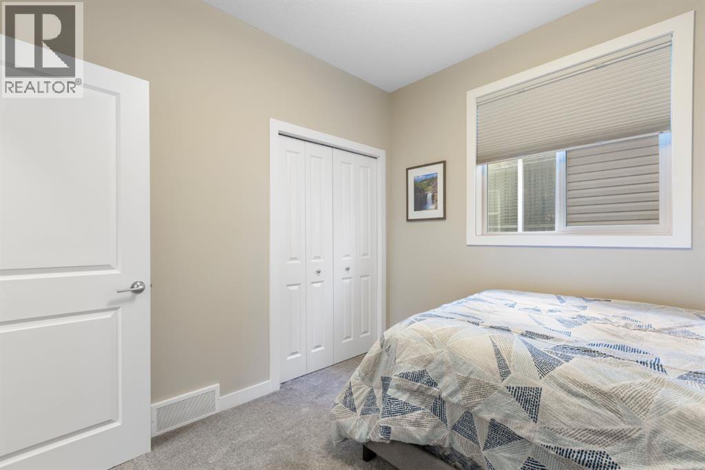 86 Bayview Circle Sw, Airdrie, AB - Indoor Photo Showing Bedroom