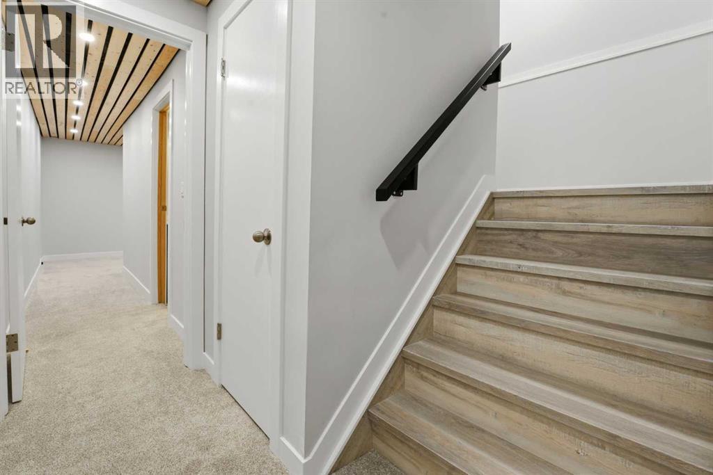 Stairs to the basement level - 4 Pardue Close, Red Deer, AB - Indoor Photo Showing Other Room