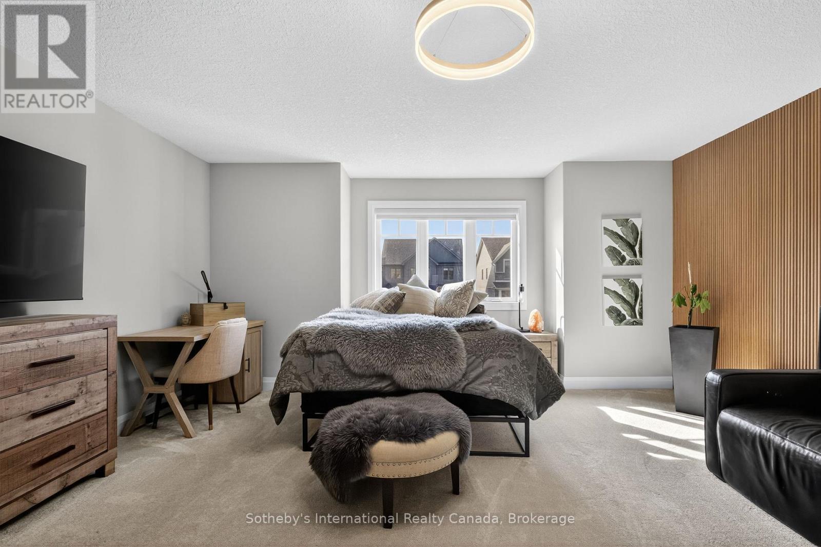 Feature wall in Primary Bedroom - 150 Plewes Drive, Collingwood, ON - Indoor Photo Showing Bedroom