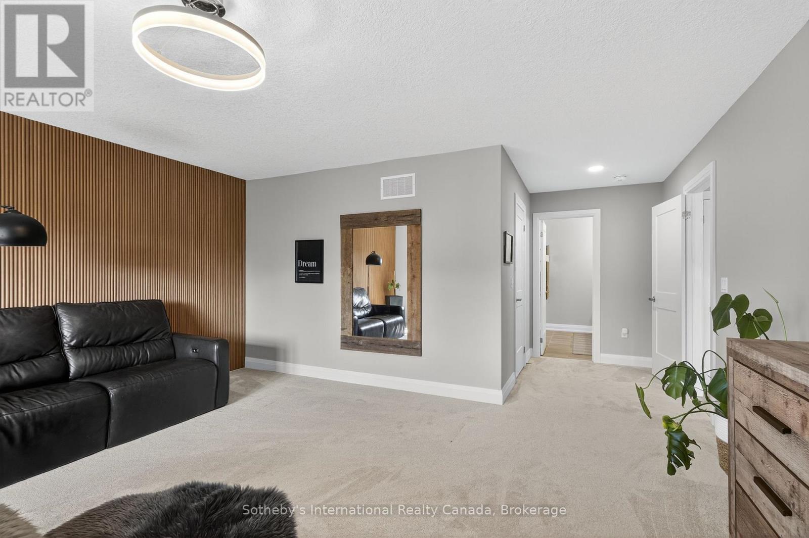 Primary Bedroom large enough for sitting area - 150 Plewes Drive, Collingwood, ON - Indoor Photo Showing Living Room