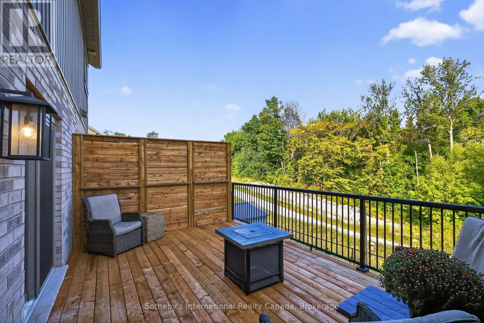Back yard looks onto green space and trail - 150 Plewes Drive, Collingwood, ON - Outdoor With Deck Patio Veranda With Exterior