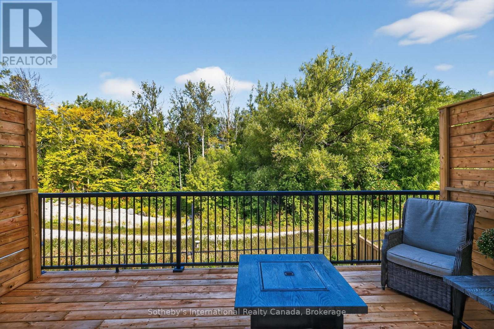 Deck overlooks trail and green space - 150 Plewes Drive, Collingwood, ON - Outdoor With Exterior