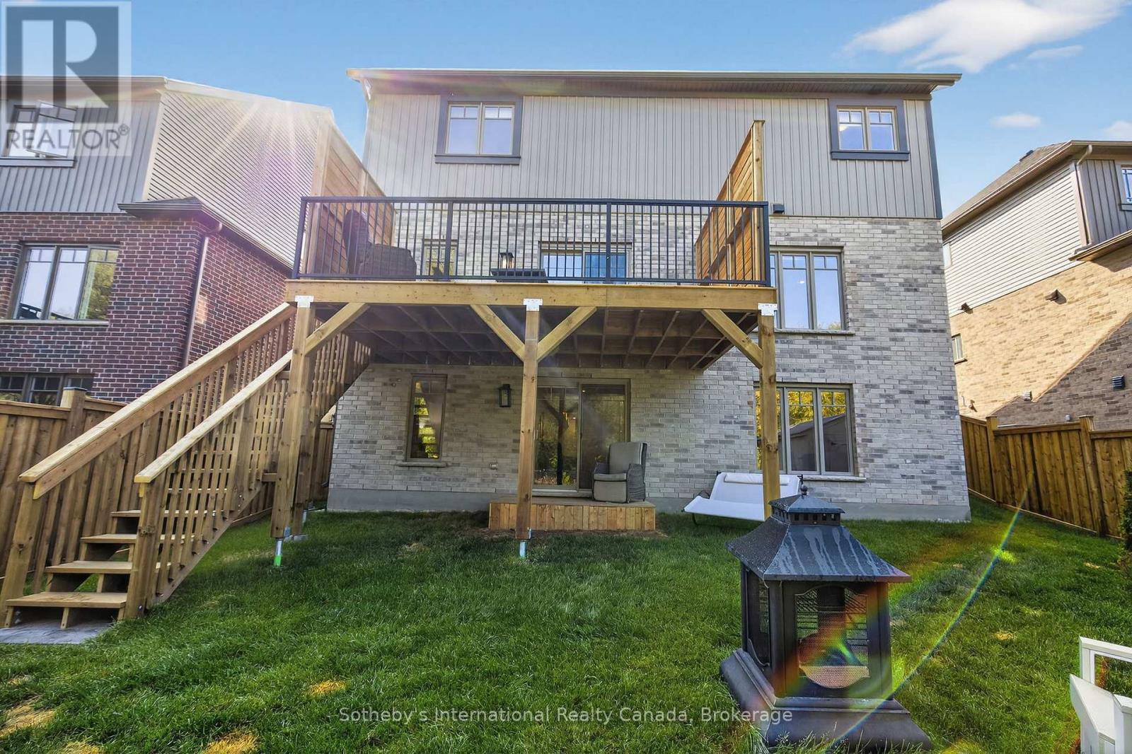 Upper deck with stairs to back yard - 150 Plewes Drive, Collingwood, ON - Outdoor With Exterior