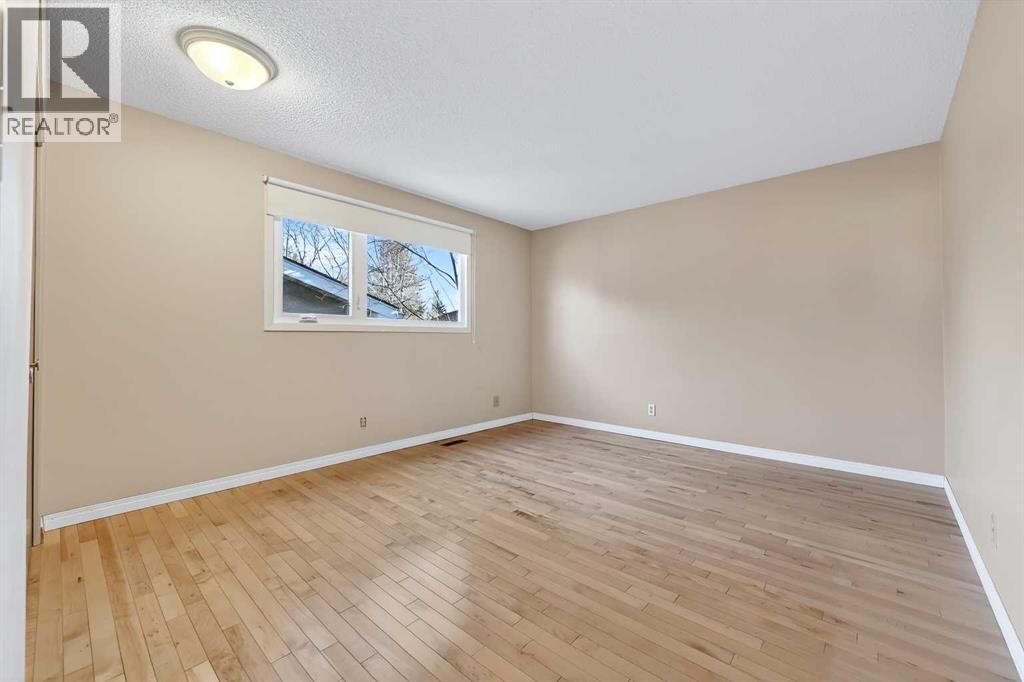 Primary Bedroom - 5315 Valiant Drive Nw, Calgary, AB - Indoor Photo Showing Other Room