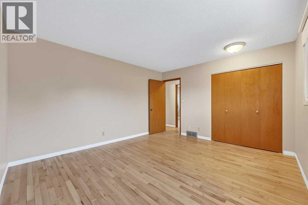 Primary Bedroom - 5315 Valiant Drive Nw, Calgary, AB - Indoor Photo Showing Other Room