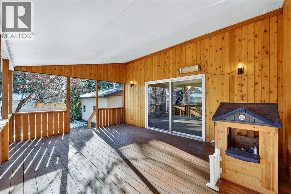 Covered Back Deck 19'2" x 13'8" - 5315 Valiant Drive Nw, Calgary, AB - Outdoor With Deck Patio Veranda With Exterior