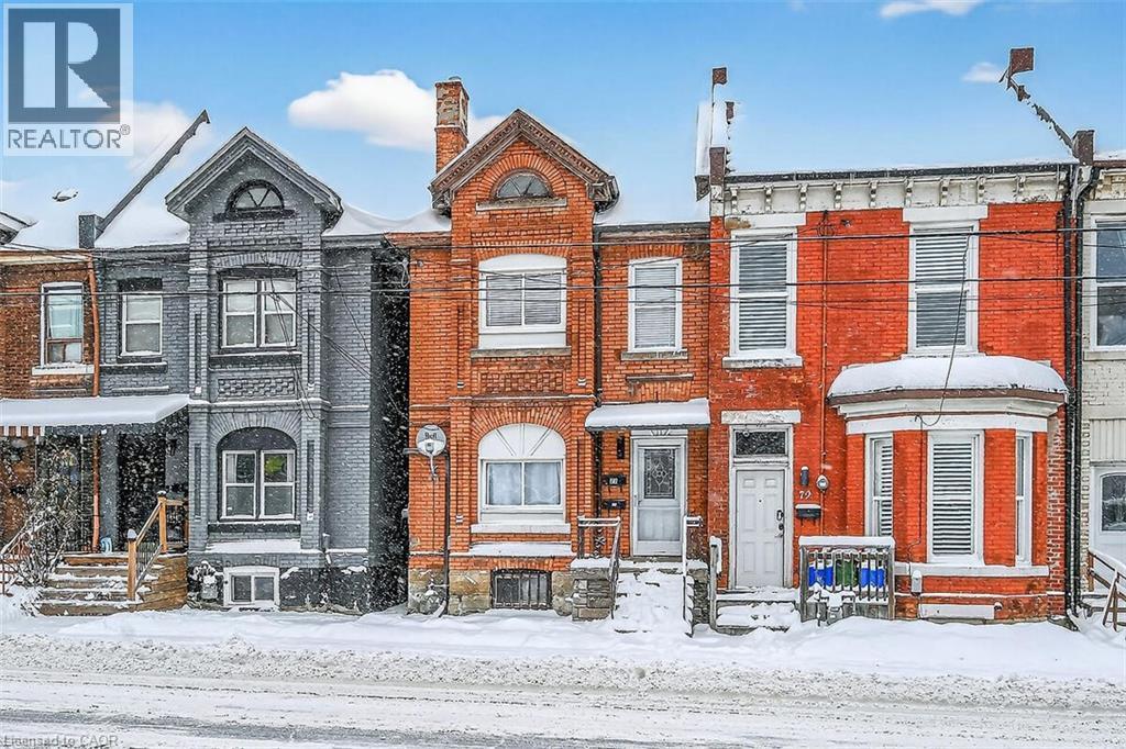View of front of house featuring brick siding and a chimney - 77 Barton Street E Unit# 2, Hamilton, ON - Outdoor With Facade