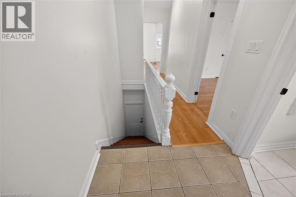 Upper hallway, view to entrance door, views of bedroom, bathroom and living room. - 77 Barton Street E Unit# 2, Hamilton, ON - Indoor Photo Showing Other Room