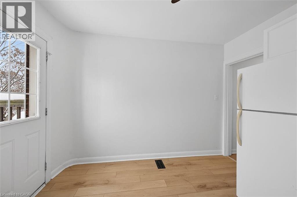 Kitchen with door to balcony - 77 Barton Street E Unit# 2, Hamilton, ON - Indoor Photo Showing Other Room
