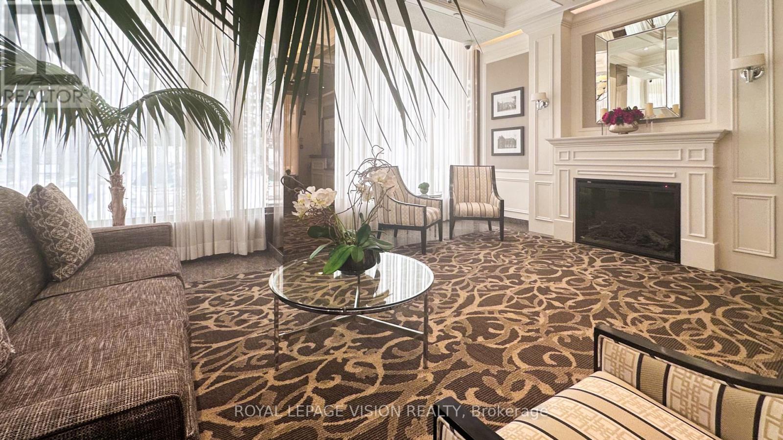 1501 - 75 Graydon Hall Drive, Toronto, ON - Indoor Photo Showing Living Room With Fireplace