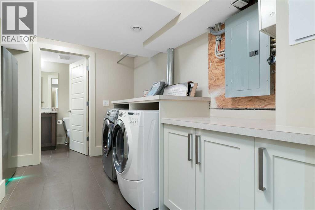 4711 Norquay Drive Nw, Calgary, AB - Indoor Photo Showing Laundry Room