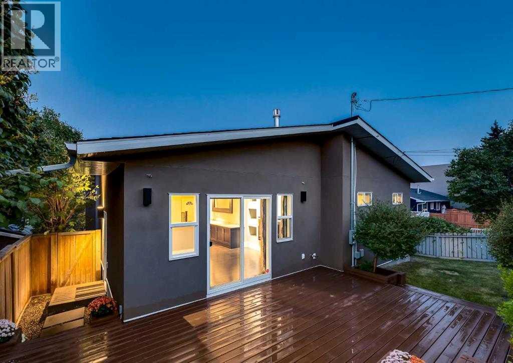 Summer photo - 4711 Norquay Drive Nw, Calgary, AB - Outdoor With Deck Patio Veranda With Exterior