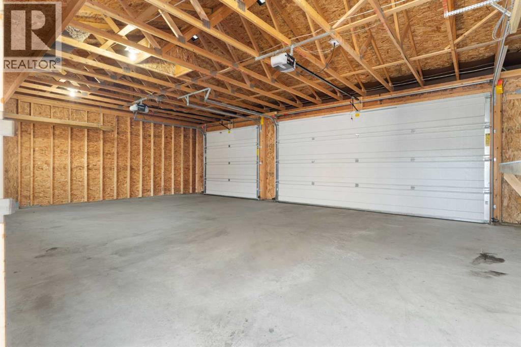 4711 Norquay Drive Nw, Calgary, AB - Indoor Photo Showing Garage