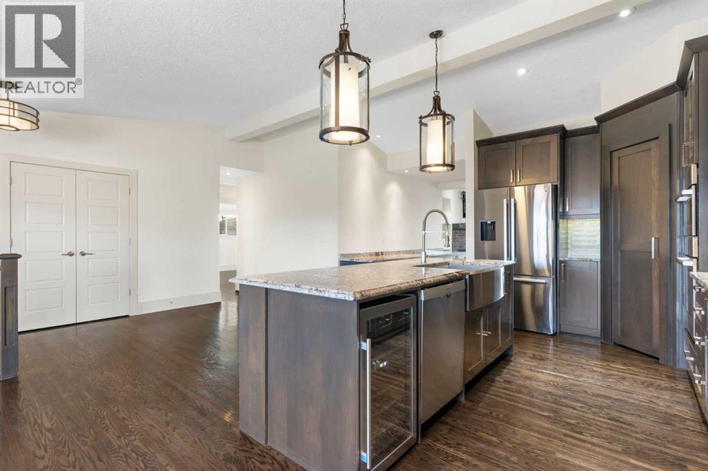 4711 Norquay Drive Nw, Calgary, AB - Indoor Photo Showing Kitchen With Stainless Steel Kitchen With Upgraded Kitchen