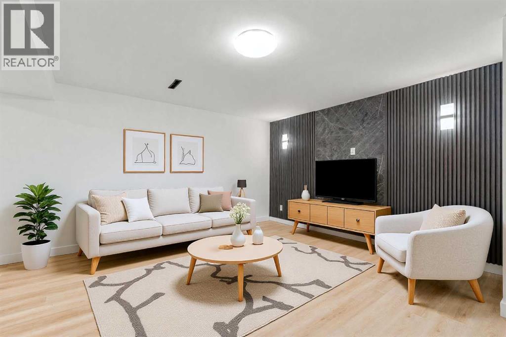 Living Room- Basement - 4720 Fordham Crescent Se, Calgary, AB - Indoor Photo Showing Living Room