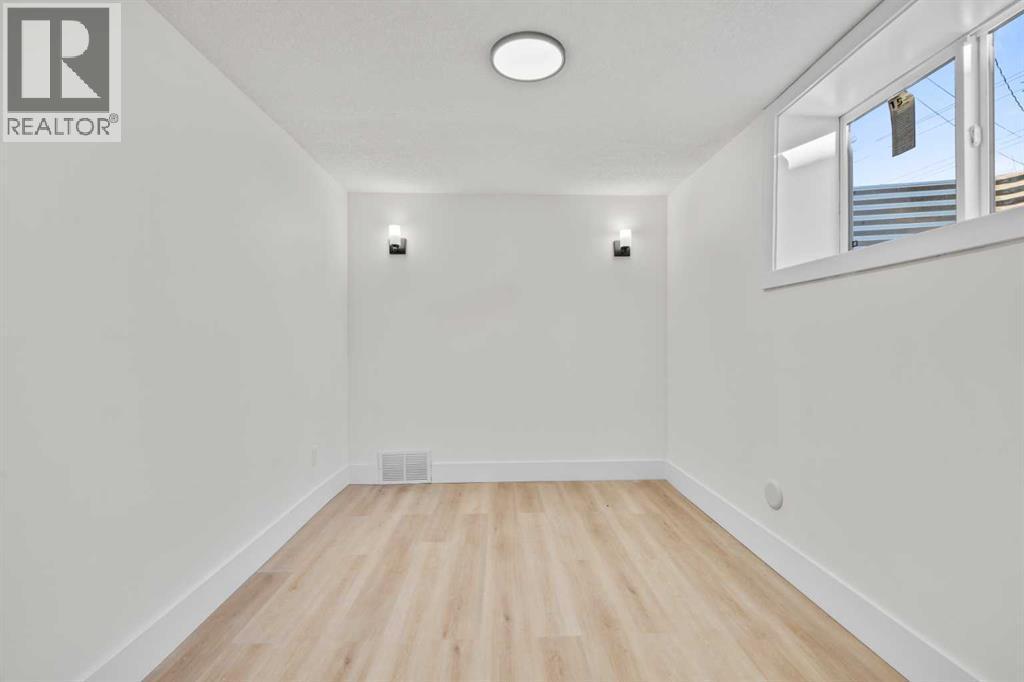 Bedroom - 4720 Fordham Crescent Se, Calgary, AB - Indoor Photo Showing Other Room