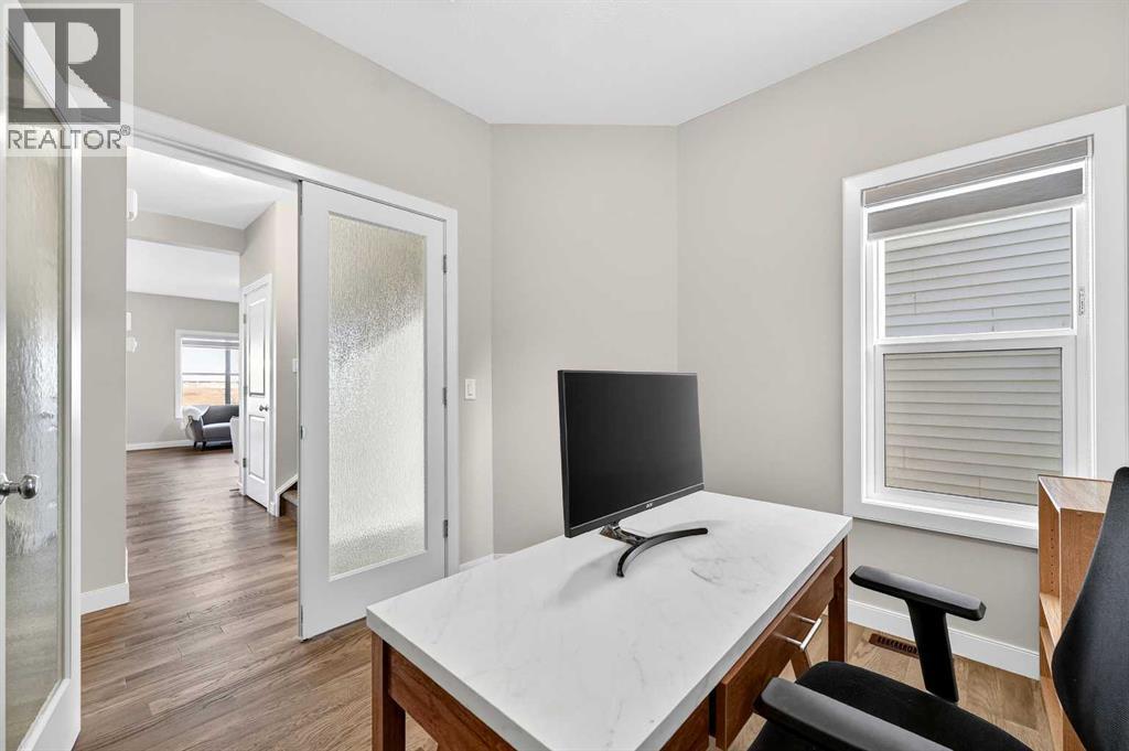 main floor den/office/bedroom - 77 Belvedere Drive Se, Calgary, AB - Indoor Photo Showing Office