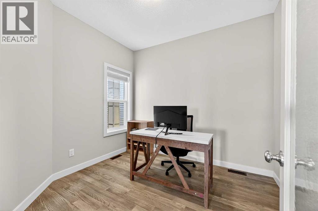 main floor den/office/bedroom - 77 Belvedere Drive Se, Calgary, AB - Indoor Photo Showing Office