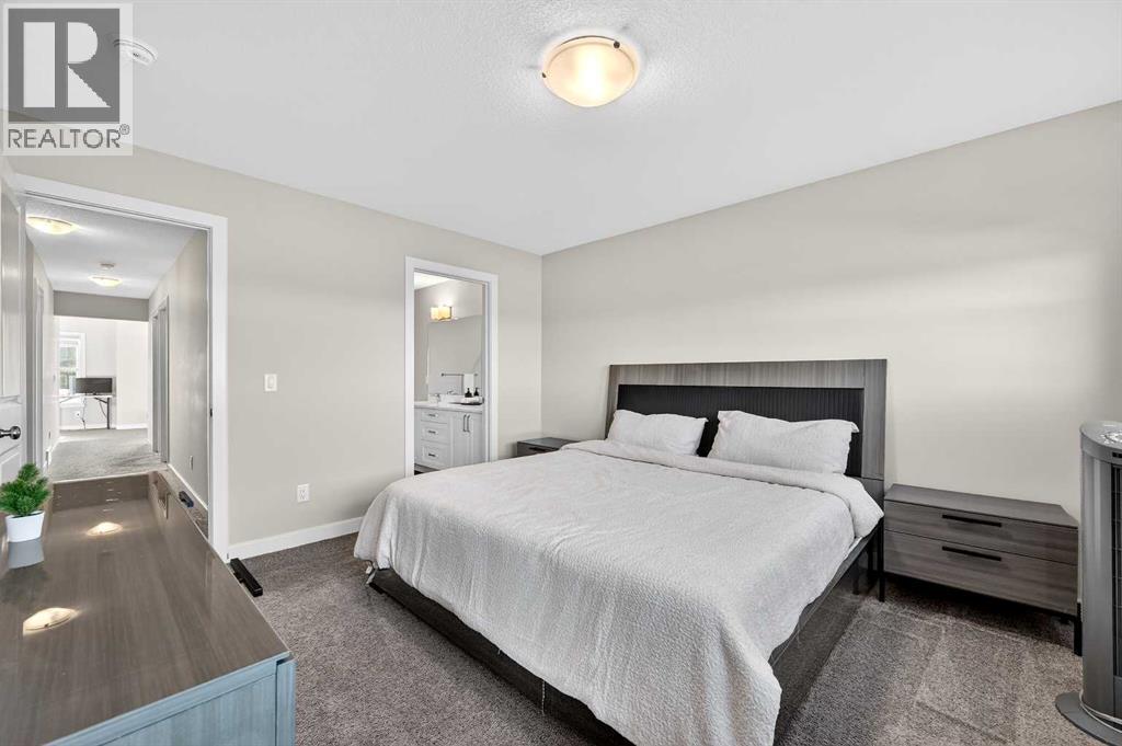 77 Belvedere Drive Se, Calgary, AB - Indoor Photo Showing Bedroom